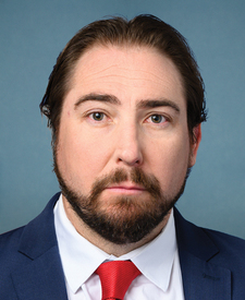 Official portrait of Elijah Crane