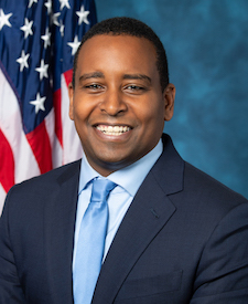 Official portrait of Joe Neguse